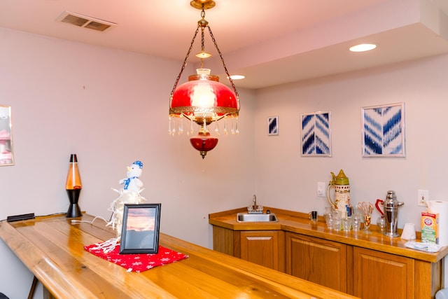 indoor wet bar with recessed lighting