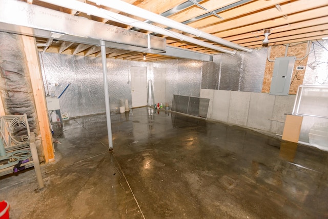 unfinished below grade area featuring electric panel