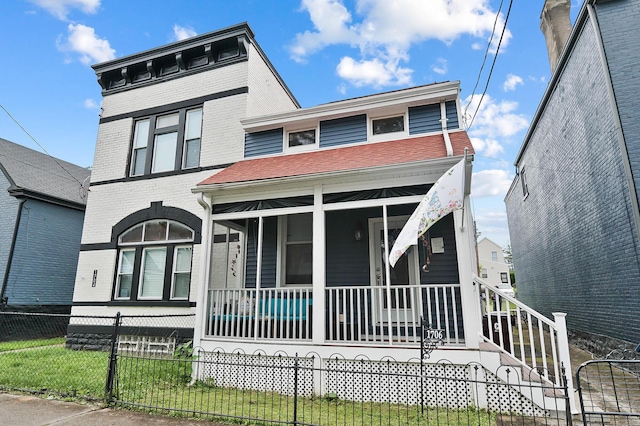 1706 Banklick St, Covington, KY 41011 - view of front of property featuring covered porch, a fenced front yard, and roof with shingles
