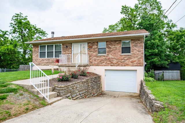 2220 Genevieve Ln, Covington, KY 41011 - ranch-style house featuring driveway, a garage, and brick siding