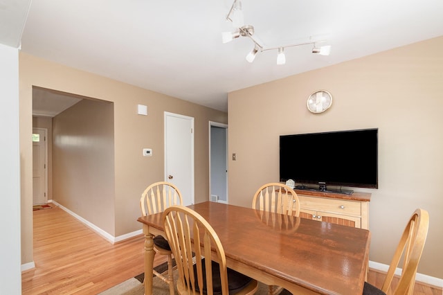 2534 Buttermilk Pike, Fort Mitchell, KY 41017 - dining room with light wood-type flooring and baseboards
