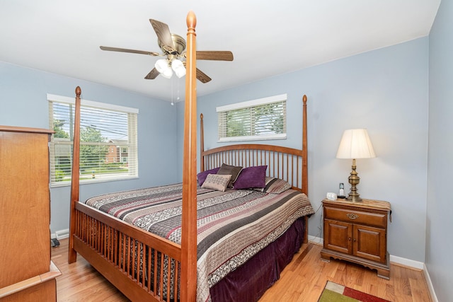 2534 Buttermilk Pike, Fort Mitchell, KY 41017 - bedroom with multiple windows, light wood-style flooring, and ceiling fan