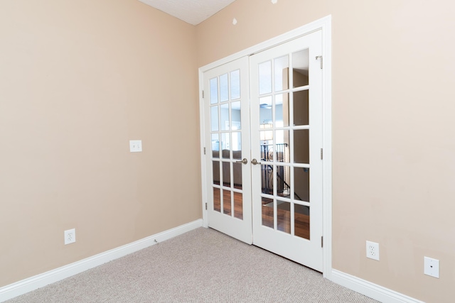 567 Riverpointe Dr Unit 11, Dayton, KY 41074 - carpeted spare room with french doors and baseboards