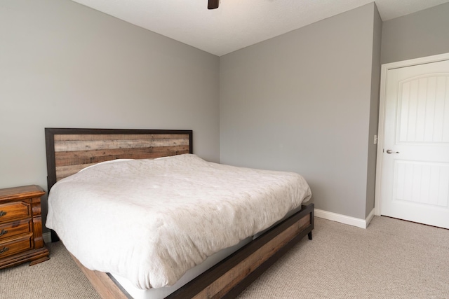 567 Riverpointe Dr Unit 11, Dayton, KY 41074 - carpeted bedroom featuring baseboards and a ceiling fan