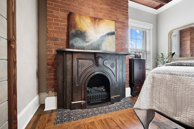519 Greenup St Unit A, Covington, KY 41011 - detailed view of crown molding, wood finished floors, and a fireplace with flush hearth