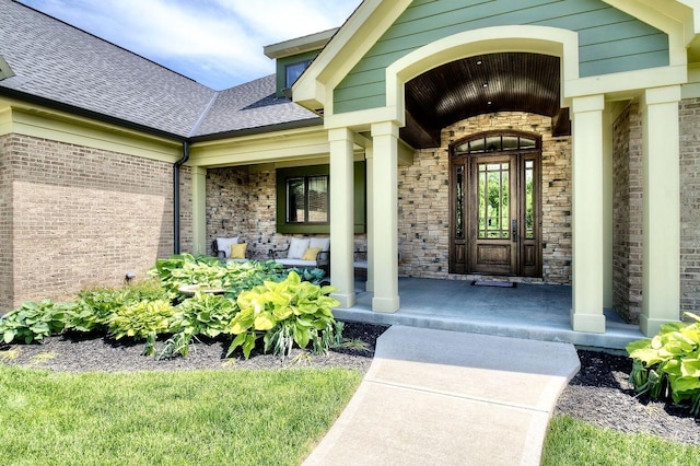3257 Ivy Ridge Dr, Taylor Mill, KY 41015 - property entrance featuring a porch, a shingled roof, and brick siding