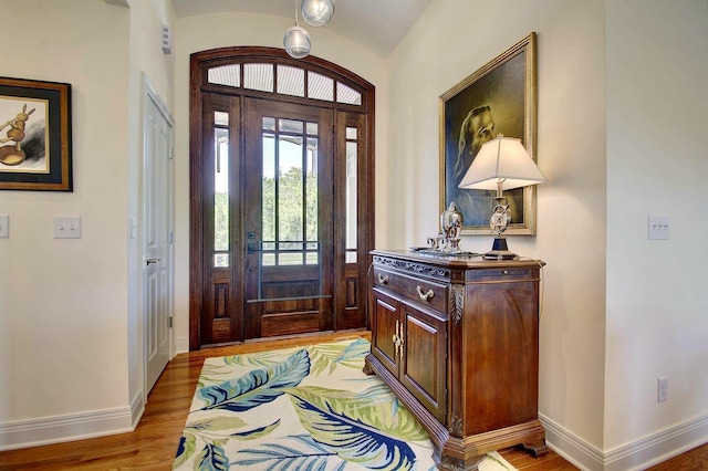 3257 Ivy Ridge Dr, Taylor Mill, KY 41015 - entryway featuring light wood-type flooring, baseboards, and vaulted ceiling