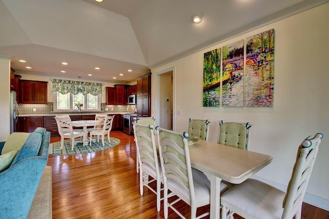 3257 Ivy Ridge Dr, Taylor Mill, KY 41015 - dining room with vaulted ceiling, light wood-style floors, recessed lighting, and ornamental molding