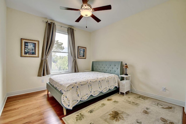 3257 Ivy Ridge Dr, Taylor Mill, KY 41015 - bedroom with baseboards, wood finished floors, and ceiling fan
