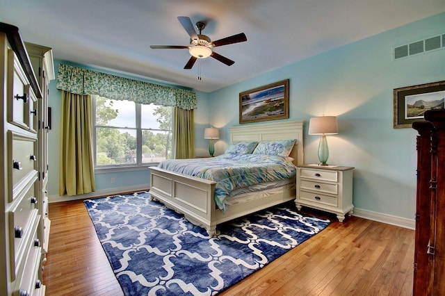 3257 Ivy Ridge Dr, Taylor Mill, KY 41015 - bedroom featuring baseboards, light wood-style flooring, and ceiling fan
