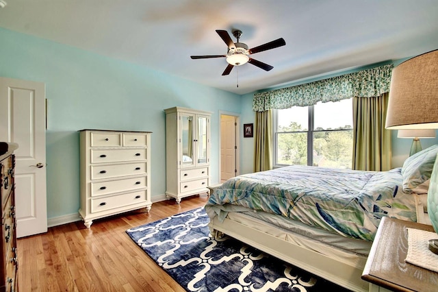 3257 Ivy Ridge Dr, Taylor Mill, KY 41015 - bedroom with wood finished floors, baseboards, and ceiling fan