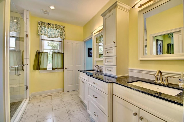 3257 Ivy Ridge Dr, Taylor Mill, KY 41015 - full bathroom featuring marble look tiles, a stall shower, double vanity, recessed lighting, and baseboards