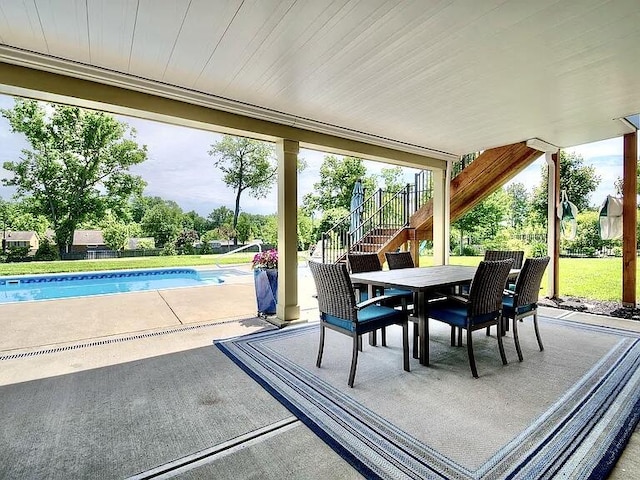 3257 Ivy Ridge Dr, Taylor Mill, KY 41015 - view of patio / terrace featuring stairs, outdoor dining area, and an outdoor pool