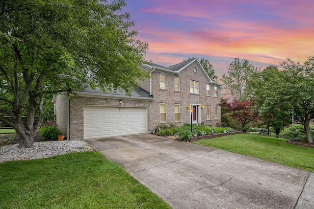 8 Whispering Woods Ln, Alexandria, KY 41001 - view of front of property with driveway, a garage, brick siding, and a lawn