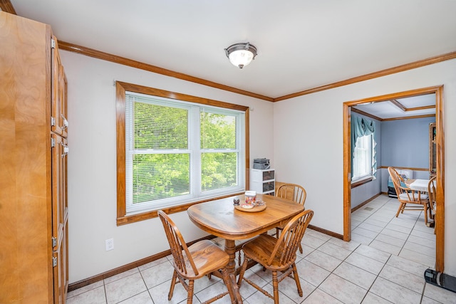8 Whispering Woods Ln, Alexandria, KY 41001 - dining room featuring healthy amount of natural light, baseboards, crown molding, and light tile patterned floors