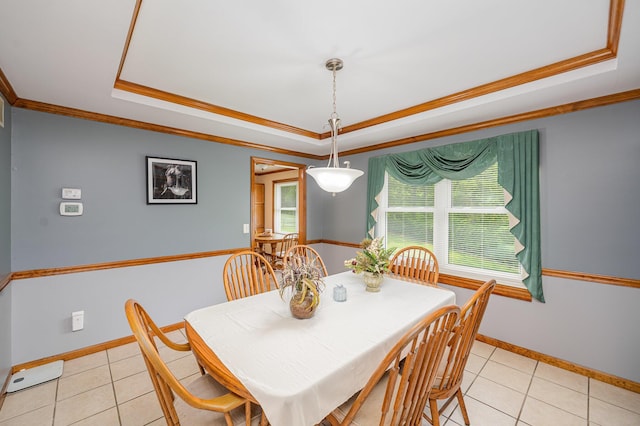 8 Whispering Woods Ln, Alexandria, KY 41001 - dining area with a tray ceiling, crown molding, light tile patterned floors, and baseboards