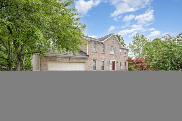 8 Whispering Woods Ln, Alexandria, KY 41001 - view of front of home featuring brick siding and driveway
