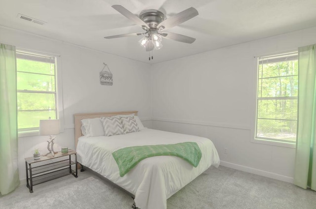 6740 Wisdom Dock Rd, Albany, KY 42602 - bedroom with multiple windows, carpet flooring, and baseboards