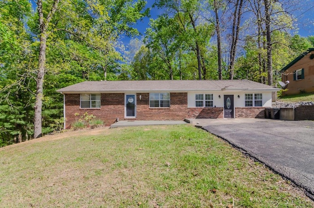 6740 Wisdom Dock Rd, Albany, KY 42602 - ranch-style house featuring brick siding, a front yard, and driveway
