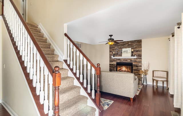 14492 Stephenson Rd, Morning View, KY 41063 - staircase with wood finished floors, a ceiling fan, a stone fireplace, and baseboards