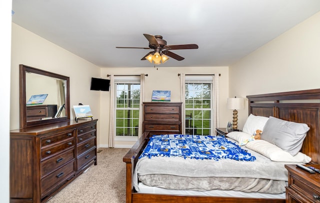 14492 Stephenson Rd, Morning View, KY 41063 - bedroom with light colored carpet, a ceiling fan, and baseboards