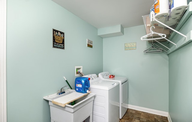 14492 Stephenson Rd, Morning View, KY 41063 - laundry room with separate washer and dryer, baseboards, and stone finish flooring