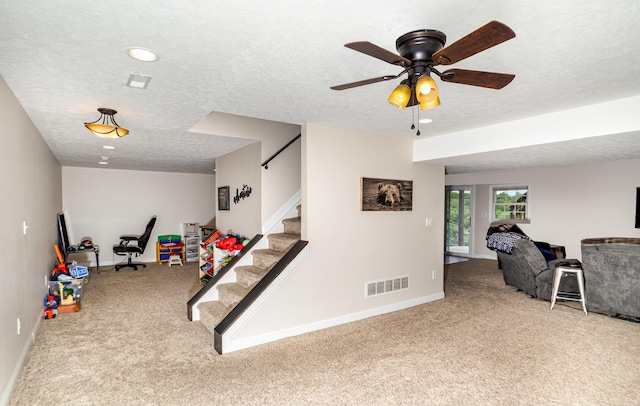 14492 Stephenson Rd, Morning View, KY 41063 - game room with carpet floors, a textured ceiling, baseboards, and a ceiling fan