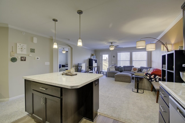 2422 Arezzo St, Covington, KY 41017 - kitchen featuring ceiling fan, light countertops, stainless steel dishwasher, crown molding, and pendant lighting