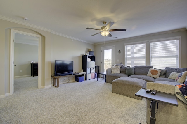 2422 Arezzo St, Covington, KY 41017 - living room featuring carpet floors, ceiling fan, ornamental molding, arched walkways, and baseboards