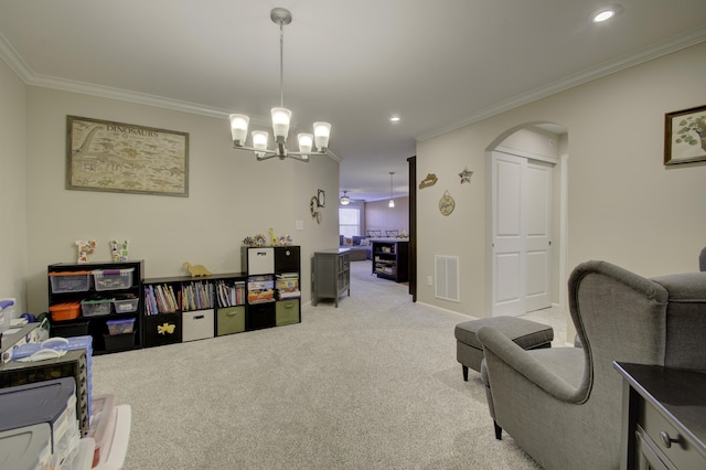 2422 Arezzo St, Covington, KY 41017 - sitting room featuring carpet floors, crown molding, arched walkways, a chandelier, and recessed lighting