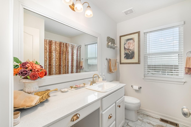10988 Dairybarn Ln, Alexandria, KY 41001 - full bathroom featuring marble look tile flooring, toilet, vanity, and baseboards