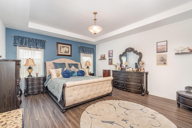 10988 Dairybarn Ln, Alexandria, KY 41001 - bedroom featuring baseboards, wood finished floors, and a raised ceiling