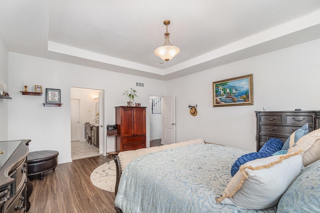 10988 Dairybarn Ln, Alexandria, KY 41001 - bedroom with a raised ceiling, dark wood-type flooring, and baseboards