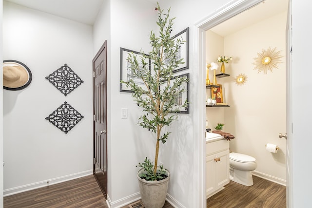 10988 Dairybarn Ln, Alexandria, KY 41001 - bathroom featuring wood finished floors, toilet, vanity, and baseboards