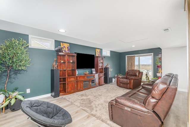 10988 Dairybarn Ln, Alexandria, KY 41001 - living area featuring wood finished floors, baseboards, recessed lighting, and attic access