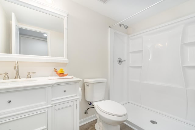 10988 Dairybarn Ln, Alexandria, KY 41001 - full bath featuring toilet, a shower, vanity, and baseboards
