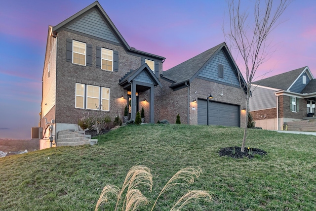10988 Dairybarn Ln, Alexandria, KY 41001 - view of front facade with brick siding, a front lawn, and central air condition unit