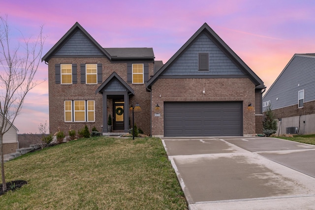 10988 Dairybarn Ln, Alexandria, KY 41001 - traditional-style home featuring driveway, brick siding, central AC unit, and a front lawn