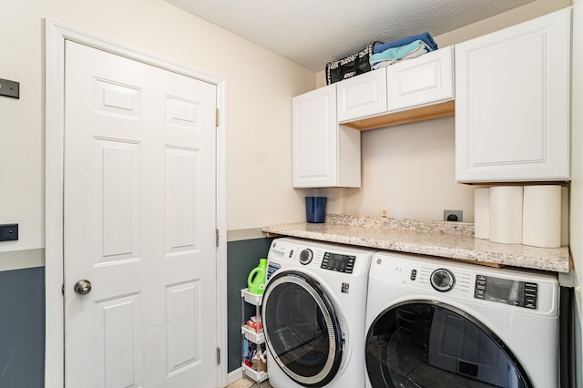 1051 Apple Blossom Dr, Florence, KY 41042 - laundry area featuring separate washer and dryer and cabinet space