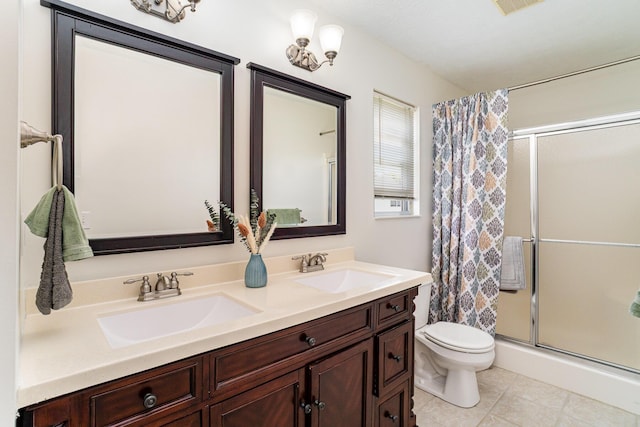 1051 Apple Blossom Dr, Florence, KY 41042 - bathroom featuring a shower with curtain, toilet, double vanity, and tile patterned flooring