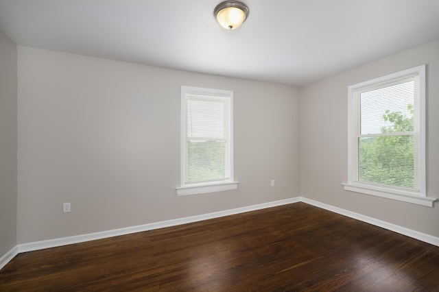 2789 Madison Ave, Covington, KY 41015 - unfurnished room featuring baseboards and dark wood-type flooring