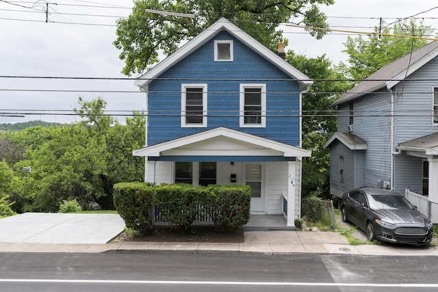 2789 Madison Ave, Covington, KY 41015 - american foursquare style home with covered porch and a chimney