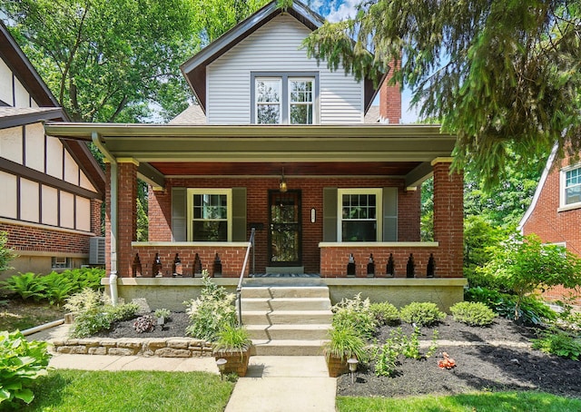 1126 Audubon Rd, Park Hills, KY 41011 - view of front of house featuring a porch, brick siding, and a chimney