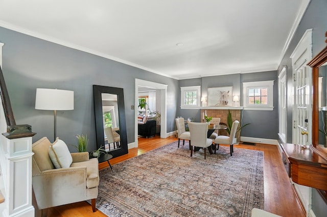 1126 Audubon Rd, Park Hills, KY 41011 - living area with baseboards, wood finished floors, and ornamental molding