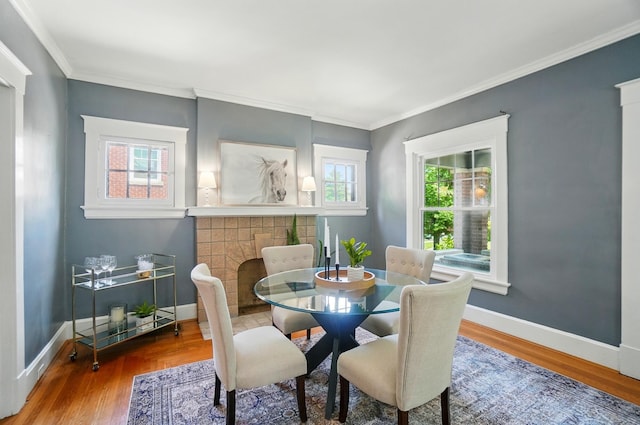 1126 Audubon Rd, Park Hills, KY 41011 - dining room with plenty of natural light, wood finished floors, baseboards, and crown molding