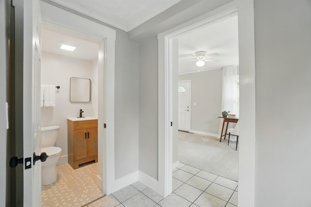 1126 Audubon Rd, Park Hills, KY 41011 - hall featuring baseboards, crown molding, and light tile patterned floors
