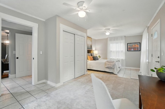 1126 Audubon Rd, Park Hills, KY 41011 - bedroom featuring light tile patterned flooring, crown molding, baseboards, a closet, and ceiling fan