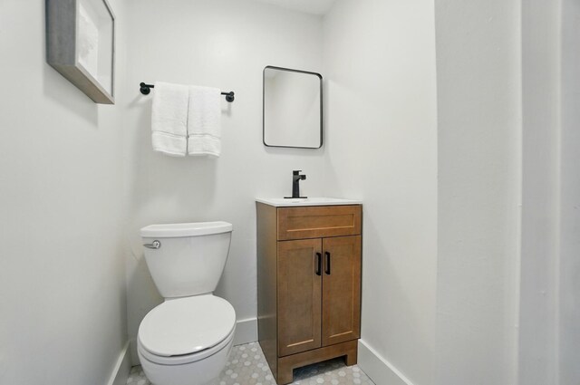 1126 Audubon Rd, Park Hills, KY 41011 - half bathroom with baseboards, vanity, and toilet