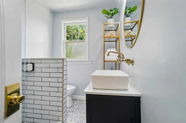 1126 Audubon Rd, Park Hills, KY 41011 - bathroom featuring toilet, vanity, tile patterned floors, and baseboards