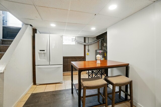 1126 Audubon Rd, Park Hills, KY 41011 - dining room with water heater, baseboards, stairway, a drop ceiling, and recessed lighting